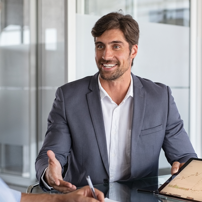 Advisor smiles during meeting